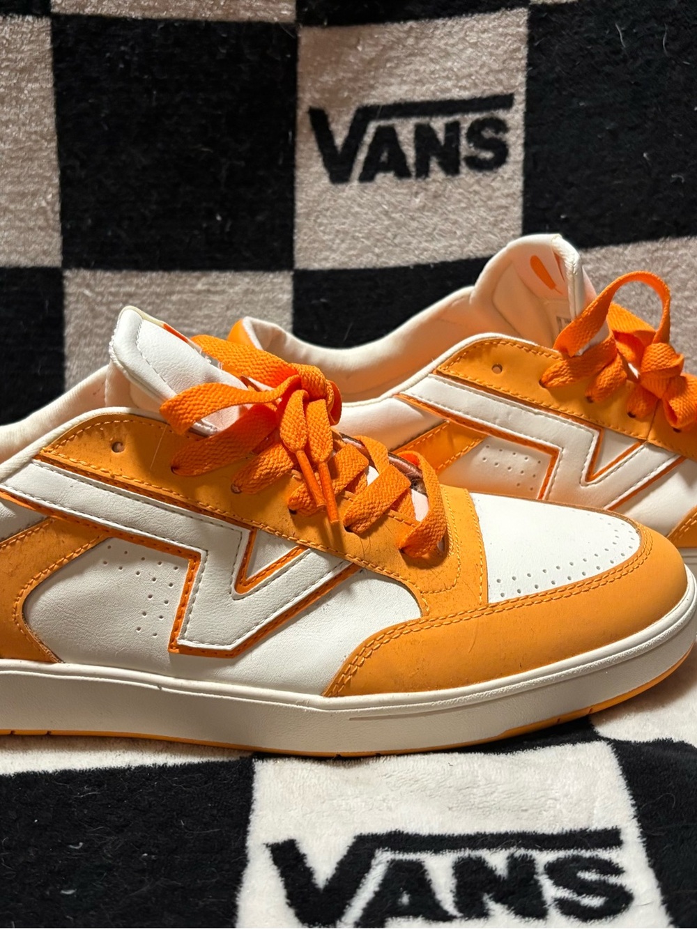 Vans Lowland CC sneakers in a vibrant "Creamsicle Orange" colorway